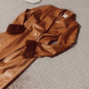 Brown chestnut leather look trench coat with faux fur collar and cuff detail